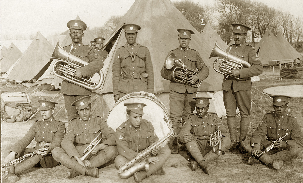 image Nine members of the No. 2 Construction Battalion band with instruments