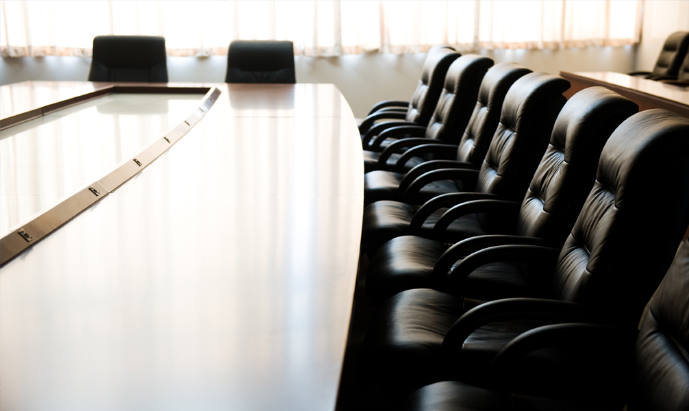 Photo of empty board room. Photo of empty board room.
